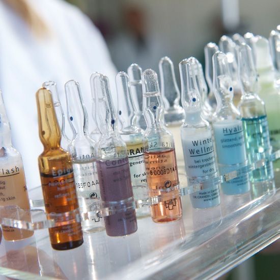 Various ampoules and vials representing pharmaceutical binders for tablet cohesion